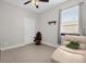 Home office with ceiling fan and neutral color palette at 325 Daffodil Ln, Kissimmee, FL 34759