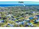 Aerial view of a home near the beach, Publix, and other homes at 606 S Pine St, New Smyrna Beach, FL 32169