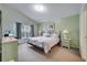 Serene main bedroom with carpet, complemented by soothing colors and natural light at 16608 Rising Star Dr, Clermont, FL 34714