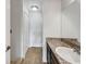 Bathroom with a shower stall, closet, and vanity at 1078 Osprey Cove Cir, Groveland, FL 34736