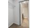 Walk-in closet with wire shelving and access to the bathroom at 1078 Osprey Cove Cir, Groveland, FL 34736