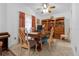 Elegant dining area with wooden furniture and stylish decor provides a warm, inviting space at 1521 Oxford Rd, Maitland, FL 32751