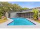 In-ground pool with a screened lanai at 1521 Oxford Rd, Maitland, FL 32751
