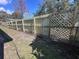 New wooden fencing installed for extra backyard privacy, set with sturdy chain link at 1951 S Crystal Lake Dr, Orlando, FL 32806