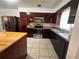Well-equipped kitchen featuring updated appliances and ample cabinet space at 1951 S Crystal Lake Dr, Orlando, FL 32806