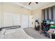 Bedroom with double closets and workspace setup at 310 Villa Sorrento Cir, Haines City, FL 33844