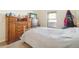Bedroom with wooden dresser and double closet at 310 Villa Sorrento Cir, Haines City, FL 33844