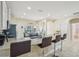 Kitchen with breakfast bar, granite countertops, and stainless steel appliances at 310 Villa Sorrento Cir, Haines City, FL 33844