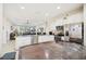 Spacious kitchen with granite countertops, stainless steel appliances, and an island at 310 Villa Sorrento Cir, Haines City, FL 33844