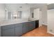 Kitchen features an island with sink and seating and a view of the living room at 409 Horizon Dr, Winter Springs, FL 32708