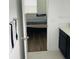 Bedroom with door to bathroom and hardwood floors at 737 Trillium Ct, Debary, FL 32713