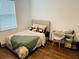 Bright bedroom with desk area featuring natural light and modern decor at 737 Trillium Ct, Debary, FL 32713
