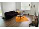 Bright living room featuring hardwood floors and ample natural light at 737 Trillium Ct, Debary, FL 32713