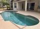 Inviting in-ground pool with a screened-in enclosure, offering a refreshing outdoor space for relaxation and recreation at 284 Pinestraw Cir, Altamonte Springs, FL 32714