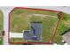 Aerial view of a single-Gathering home, showcasing its well-defined property lines and surroundings at 1302 Belmar Ter, Deltona, FL 32725