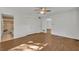 Bedroom with wood-look floors and access to bathroom at 700 Melrose Ave J 1 Ave # J1, Winter Park, FL 32789