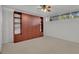 Spacious bedroom with built-in shelving and carpeting at 700 Melrose Ave J 1 Ave # J1, Winter Park, FL 32789