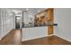 Updated kitchen boasts granite counters, wood cabinets, stainless appliances, and backyard access at 700 Melrose Ave J 1 Ave # J1, Winter Park, FL 32789