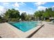 Community pool with plenty of lounge chairs at 700 Melrose Ave J 1 Ave # J1, Winter Park, FL 32789