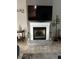 Elegant fireplace with white mantel and brick surround at 5155 Lake Deeson Woods Ct, Lakeland, FL 33805