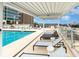 Modern rooftop pool with comfortable lounge chairs and city views at 150 E Robinson St # 1907, Orlando, FL 32801