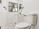 Clean bathroom with white vanity and marble-look tile at 4410 Rossmore Dr, Orlando, FL 32810