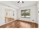 Bright dining area with hardwood floors and built in bench seating at 4410 Rossmore Dr, Orlando, FL 32810