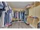 Large walk-in closet with ample shelving and hanging space at 530 E Central Blvd # 201, Orlando, FL 32801