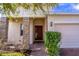 Charming front entrance with brick columns, a brick walkway, and a dark wood front door at 992 Jetway St, Orange City, FL 32763