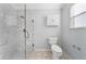 Bathroom with a large walk-in shower with a glass enclosure, gray paint, and a tiled floor at 16950 Se 80Th Bellavista Cir, The Villages, FL 32162