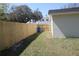 Fenced backyard space featuring a newly installed wooden fence and grassy area at 511 Reed Ne Ave, Oviedo, FL 32765