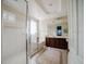 Bathroom with shower and double sinks at 8162 Via Bella Notte, Orlando, FL 32836