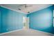 Light blue bedroom with ceiling fan at 8162 Via Bella Notte, Orlando, FL 32836