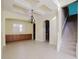 Bright dining room with tile floor, chandelier, and built-in cabinetry at 8162 Via Bella Notte, Orlando, FL 32836