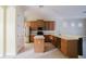Well-equipped kitchen with stainless steel appliances, island, and ample counter space at 8162 Via Bella Notte, Orlando, FL 32836