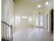 Spacious living room featuring large windows, high ceilings, and tiled floors at 8162 Via Bella Notte, Orlando, FL 32836