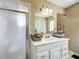 Bathroom with white vanity, shower, and tiled floor at 104 E Berkshire Cir, Longwood, FL 32779