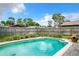 Relaxing swimming pool with tiled deck at 104 E Berkshire Cir, Longwood, FL 32779