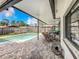 Inviting pool area with patio furniture and covered lanai at 104 E Berkshire Cir, Longwood, FL 32779
