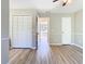 Bedroom with wood floors and large closet at 1624 Rivers Edge Dr, Orlando, FL 32825