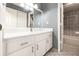 Bathroom featuring white vanity, tub, and stylish tile backsplash at 6682 Sw 106Th Ln, Ocala, FL 34476