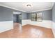 Spacious living room featuring decorative molding, neutral paint, and tile flooring at 6682 Sw 106Th Ln, Ocala, FL 34476