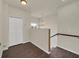 Hallway featuring a modern chandelier and a window for natural light at 821 E Story Rd, Winter Garden, FL 34787