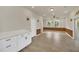 Open-concept living room with recessed lighting, ceiling fan, and neutral color palette at 821 E Story Rd, Winter Garden, FL 34787