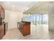 Open kitchen with granite countertops and city views at 155 S Court Ave # 2001, Orlando, FL 32801