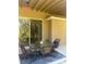 Outdoor patio with seating and privacy, perfect for relaxing and entertaining at 2719 Lakemoor Dr, Orlando, FL 32828