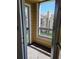 Balcony with a view of the building and shared green space at 4401 Thornbriar Ln # 202, Orlando, FL 32822