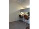 This kitchen features a breakfast bar with barstools at 5027 Se 109Th Pl, Belleview, FL 34420