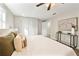 Serene main bedroom featuring ample natural light, closet, and neutral colors at 1321 Cloverlawn Ave, Orlando, FL 32806