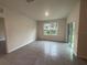 Dining room with tile floors and sliding glass doors at 2008 Red Rock Rd, New Smyrna Beach, FL 32168